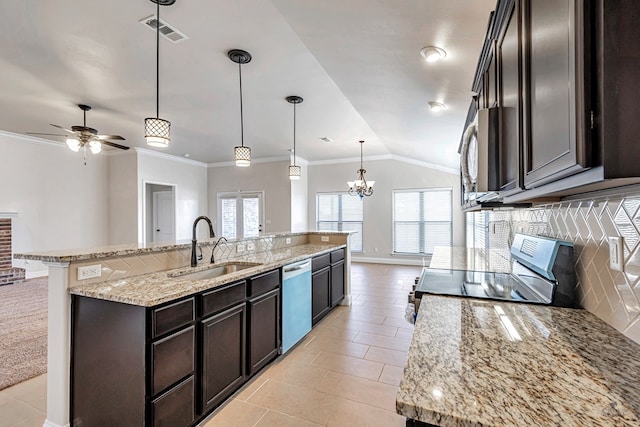 kitchen featuring stainless steel appliances, a large island, sink, pendant lighting, and lofted ceiling