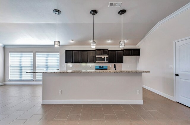 kitchen with stove, light stone counters, crown molding, decorative light fixtures, and lofted ceiling