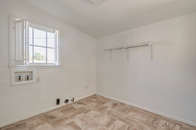 laundry area with laundry area, hookup for a washing machine, baseboards, and hookup for a gas dryer