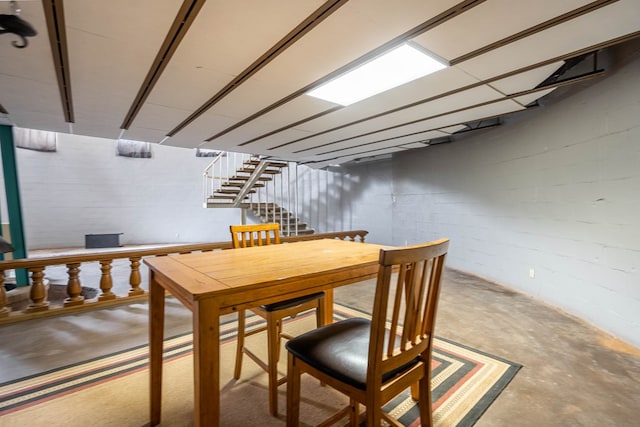 dining room with concrete floors