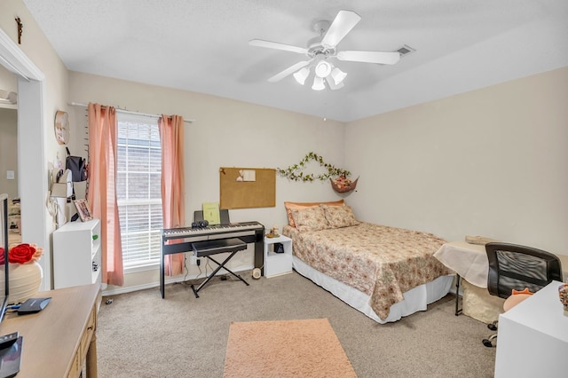 5502 Sundance Ct, Midland, TX 79707 - carpeted bedroom featuring ceiling fan, an office area, and baseboards
