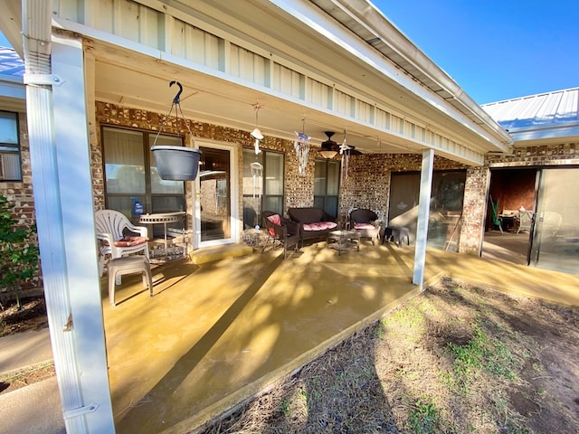 view of patio / terrace with ceiling fan