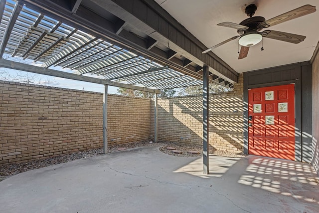 view of patio featuring ceiling fan and a pergola