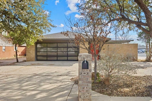 single story home featuring a garage