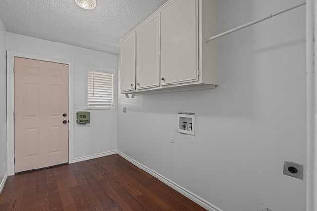 laundry room with dark wood-type flooring, cabinets, washer hookup, a textured ceiling, and hookup for an electric dryer