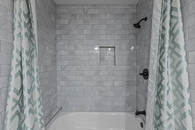 bathroom featuring shower / bath combo with shower curtain