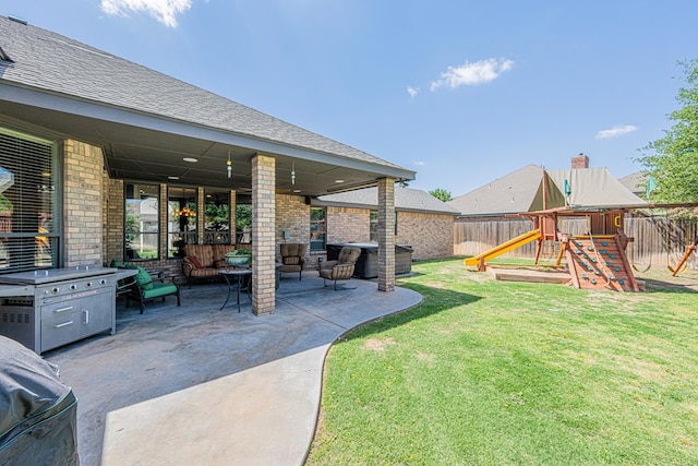 view of yard with a playground, a patio, a fenced backyard, and outdoor lounge area