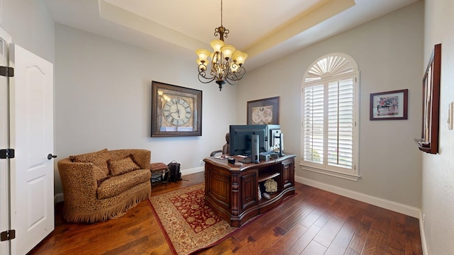 office area with baseboards, an inviting chandelier, and dark wood-style floors