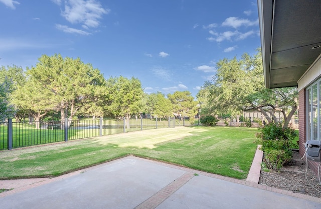 15 Lakes Dr, Midland, TX 79705 - fenced backyard with a patio area