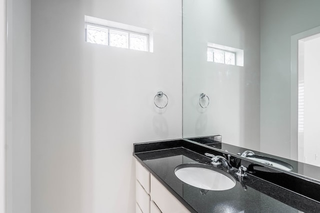 15 Lakes Dr, Midland, TX 79705 - bathroom with vanity and healthy amount of natural light