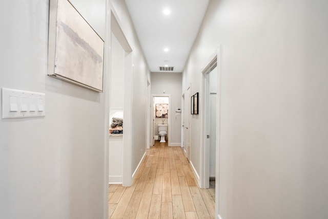 15 Lakes Dr, Midland, TX 79705 - hallway with light wood finished floors and recessed lighting