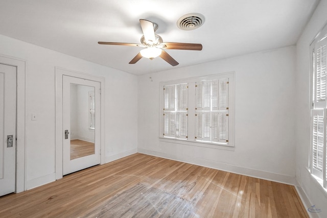 unfurnished bedroom with light wood-type flooring and ceiling fan