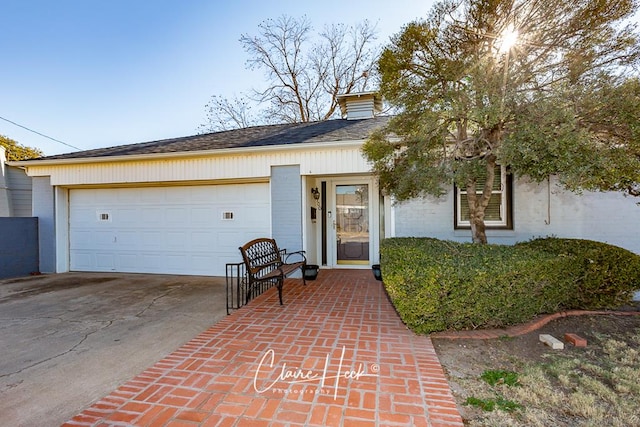 ranch-style house with a garage