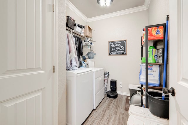 washroom with crown molding, laundry area, light wood-style floors, separate washer and dryer, and baseboards