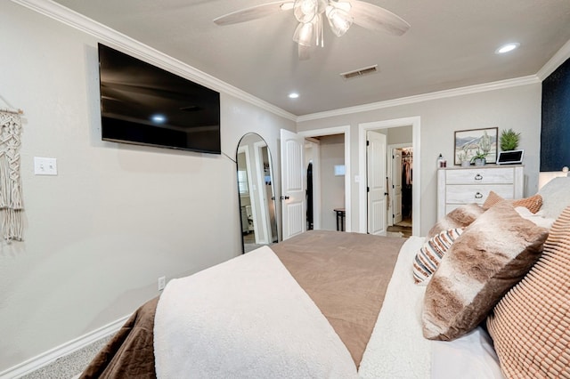 bedroom with crown molding, arched walkways, visible vents, and recessed lighting