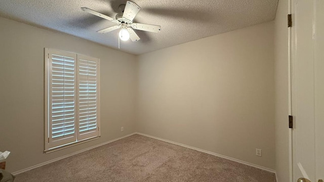 4804 Bishops Castle Dr, Midland, TX 79705 - empty room featuring carpet flooring, a ceiling fan, and a textured ceiling