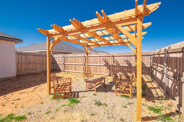 view of yard with a fenced backyard and a pergola