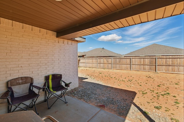 view of patio with a fenced backyard
