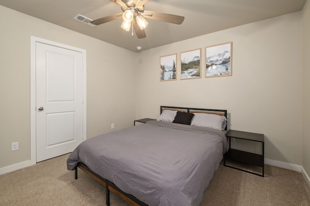 bedroom featuring carpet floors, baseboards, and visible vents
