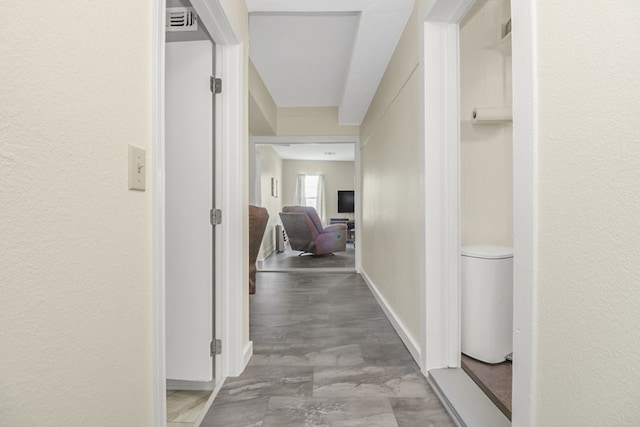 601 E 1st St, Coleman, TX 76834 - corridor featuring baseboards
