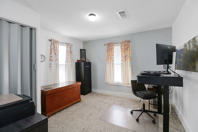 601 E 1st St, Coleman, TX 76834 - carpeted office space featuring baseboards