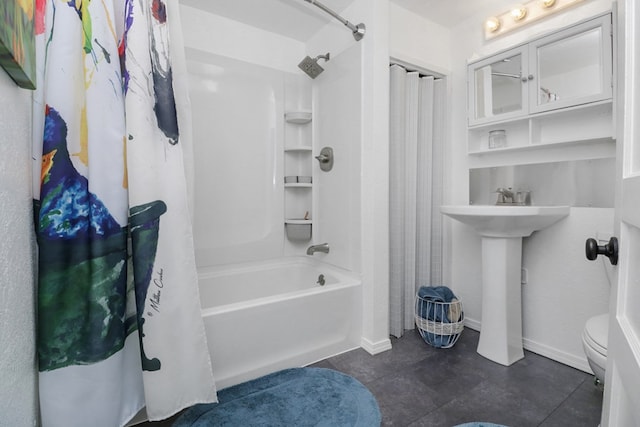 601 E 1st St, Coleman, TX 76834 - full bathroom featuring shower / bath combo and toilet