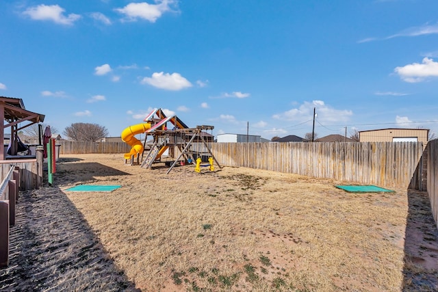 view of yard with a playground