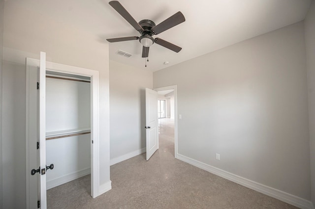 unfurnished bedroom with a closet and ceiling fan