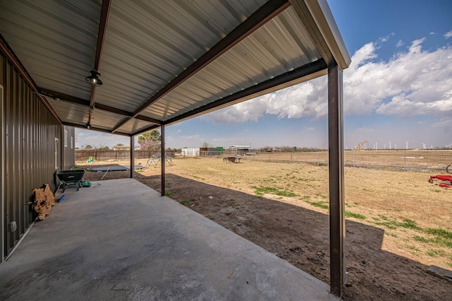 view of patio / terrace with a rural view