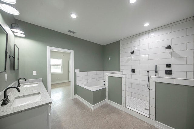 bathroom with vanity and plus walk in shower