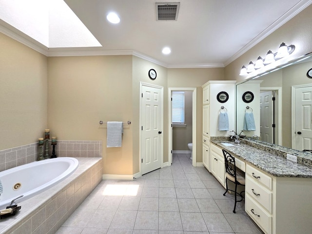 4808 W Cherrywood Ct W, Midland, TX 79707 - full bathroom featuring a tub with jets, toilet, vanity, tile patterned floors, and crown molding