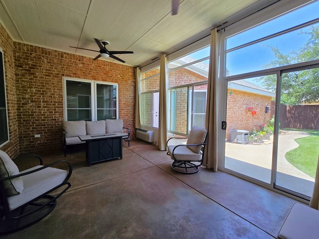 4808 W Cherrywood Ct W, Midland, TX 79707 - sunroom featuring a ceiling fan, an outdoor living space, and an AC wall unit