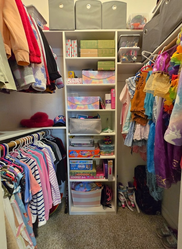4808 W Cherrywood Ct W, Midland, TX 79707 - walk in closet featuring carpet