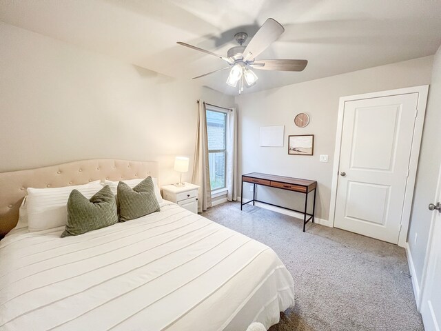 2908 Stagecoach Ct, Midland, TX 79705 - bedroom with light carpet and a ceiling fan