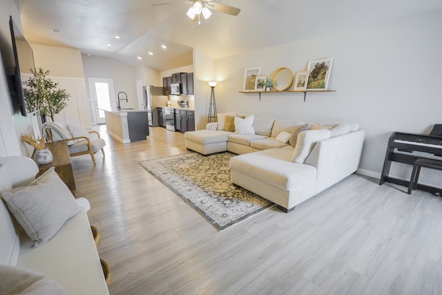 2908 Stagecoach Ct, Midland, TX 79705 - living room with ceiling fan, light wood-style floors, lofted ceiling, and recessed lighting