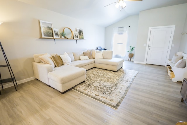 2908 Stagecoach Ct, Midland, TX 79705 - living room with vaulted ceiling, a ceiling fan, and light wood-type flooring
