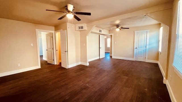 unfurnished room with ceiling fan and dark wood-type flooring