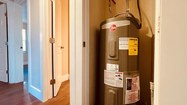 utility room with electric water heater