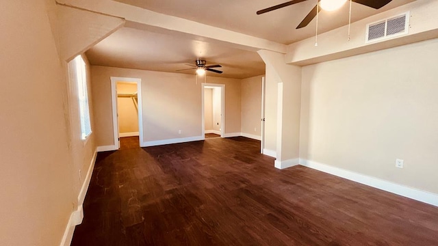 unfurnished room featuring dark hardwood / wood-style floors and ceiling fan