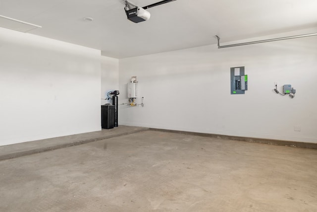 garage featuring electric panel, water heater, and a garage door opener