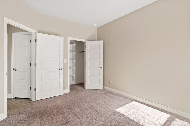 unfurnished bedroom featuring carpet