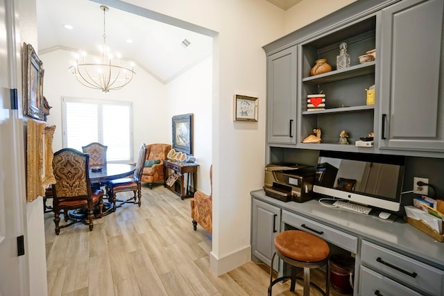 office space featuring crown molding, light hardwood / wood-style floors, lofted ceiling, and an inviting chandelier