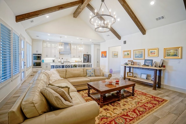 living room featuring sink, an inviting chandelier, light hardwood / wood-style flooring, beamed ceiling, and high vaulted ceiling