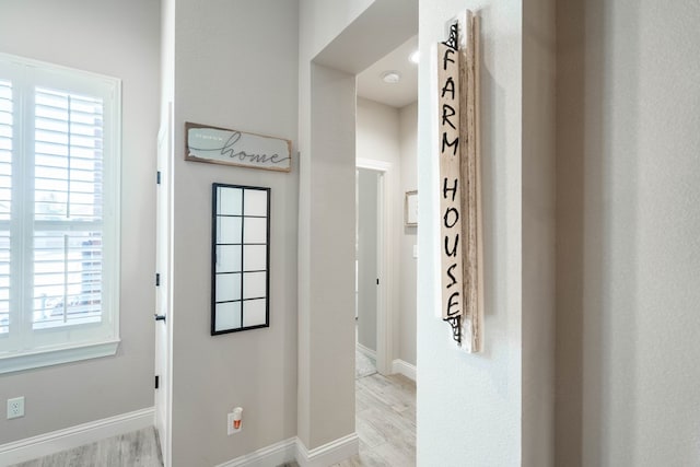 doorway with light hardwood / wood-style floors