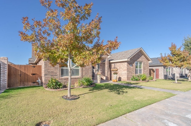 view of front of home with a front lawn