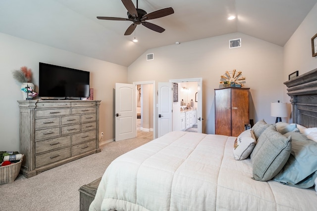 bedroom featuring connected bathroom, light colored carpet, ceiling fan, and lofted ceiling