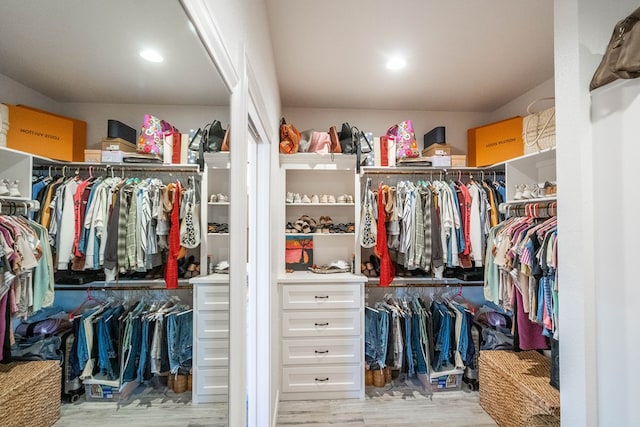 spacious closet with light wood-type flooring