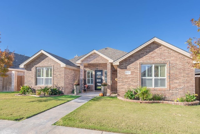 single story home featuring a front yard