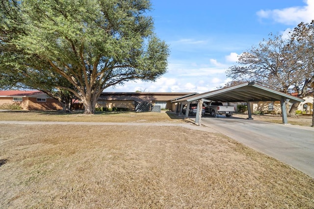 view of front facade featuring a carport