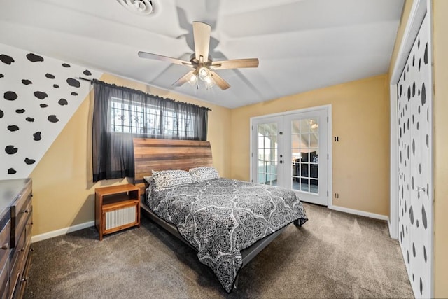 carpeted bedroom featuring multiple windows, french doors, access to outside, and ceiling fan